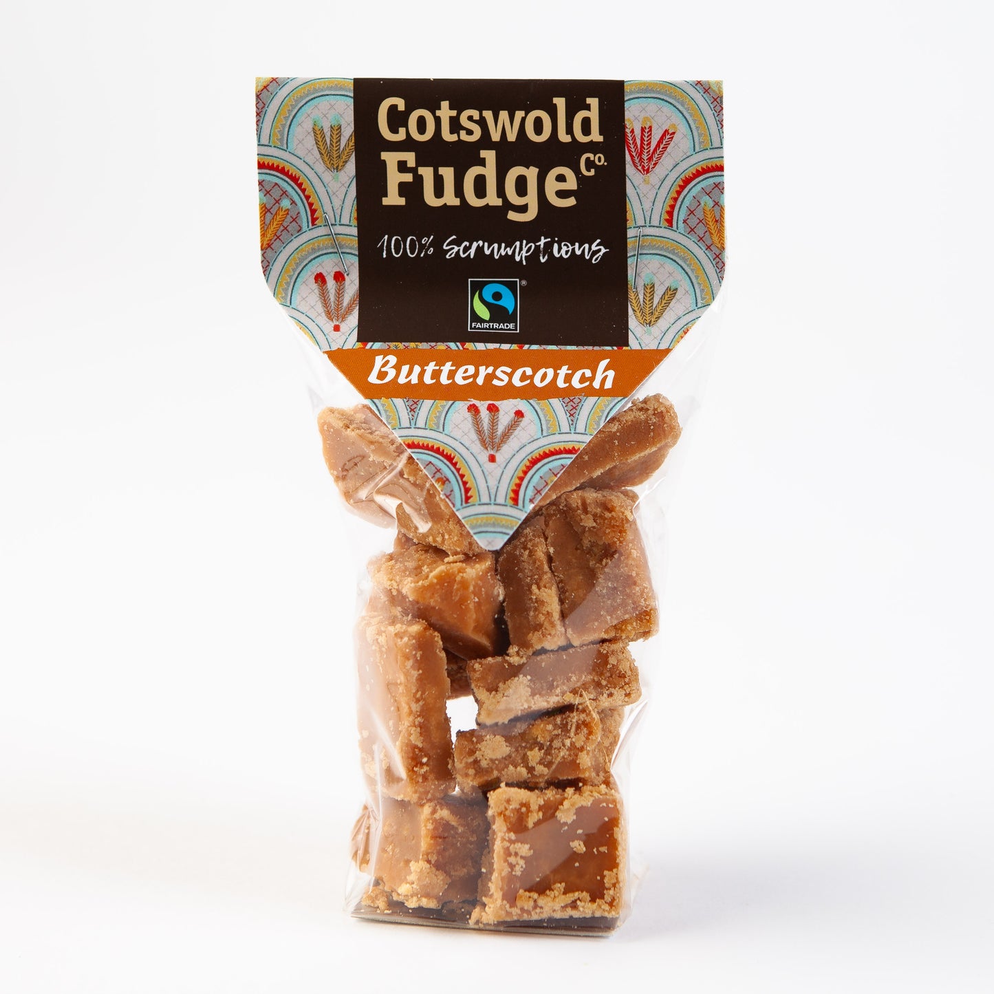 A bag of 100% scrumptious Fairtrade Butterscotch Fudge made by Cotswold Fudge Co. The bag is transparent with chunks of fudge on display.