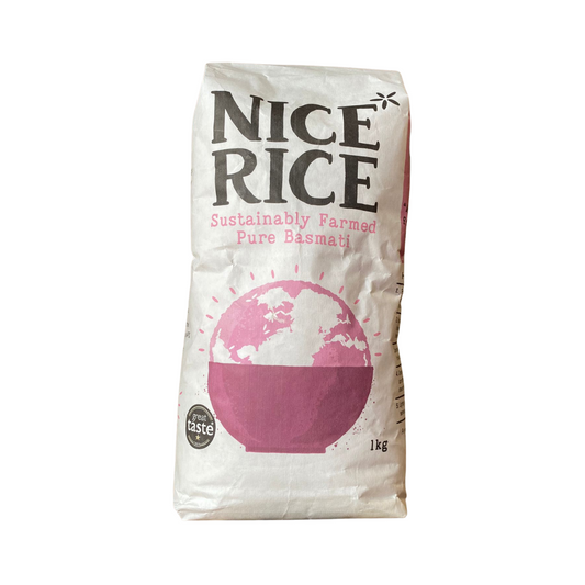 Bag of Nice Rice with a pink and white design on a white background