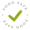 A circular white logo with a green tick in the middle and the words Food Safe around the outside.