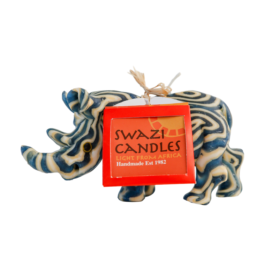 Candle in the shape of a rhino with 'Swazi Candles' packaging on a white background