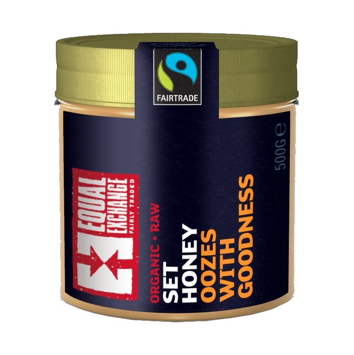 A jar of Equal Exchange organic raw set honey, 500g size, with Fair Trade certification logo.
