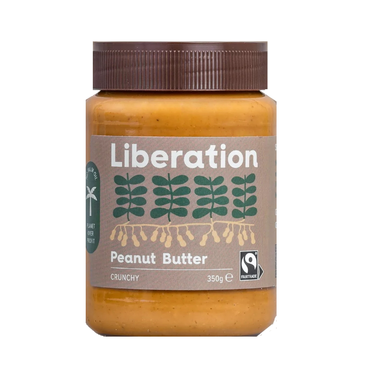 A jar of Liberation Foods Fairtrade Peanut Butter, crunchy type, with a label showing the brand name and a graphic of peanuts. The jar size is 350g.