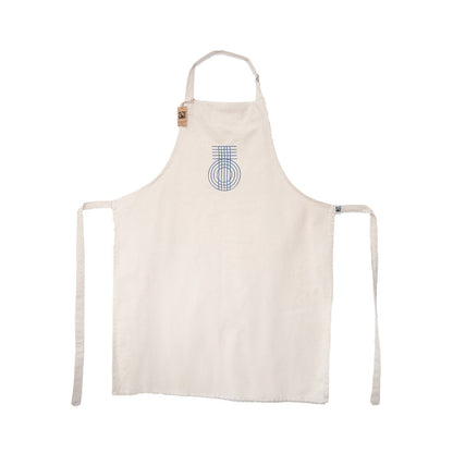 A beige apron made with Fairtrade cotton with the True Origin 'TO' weave symbol on the front.