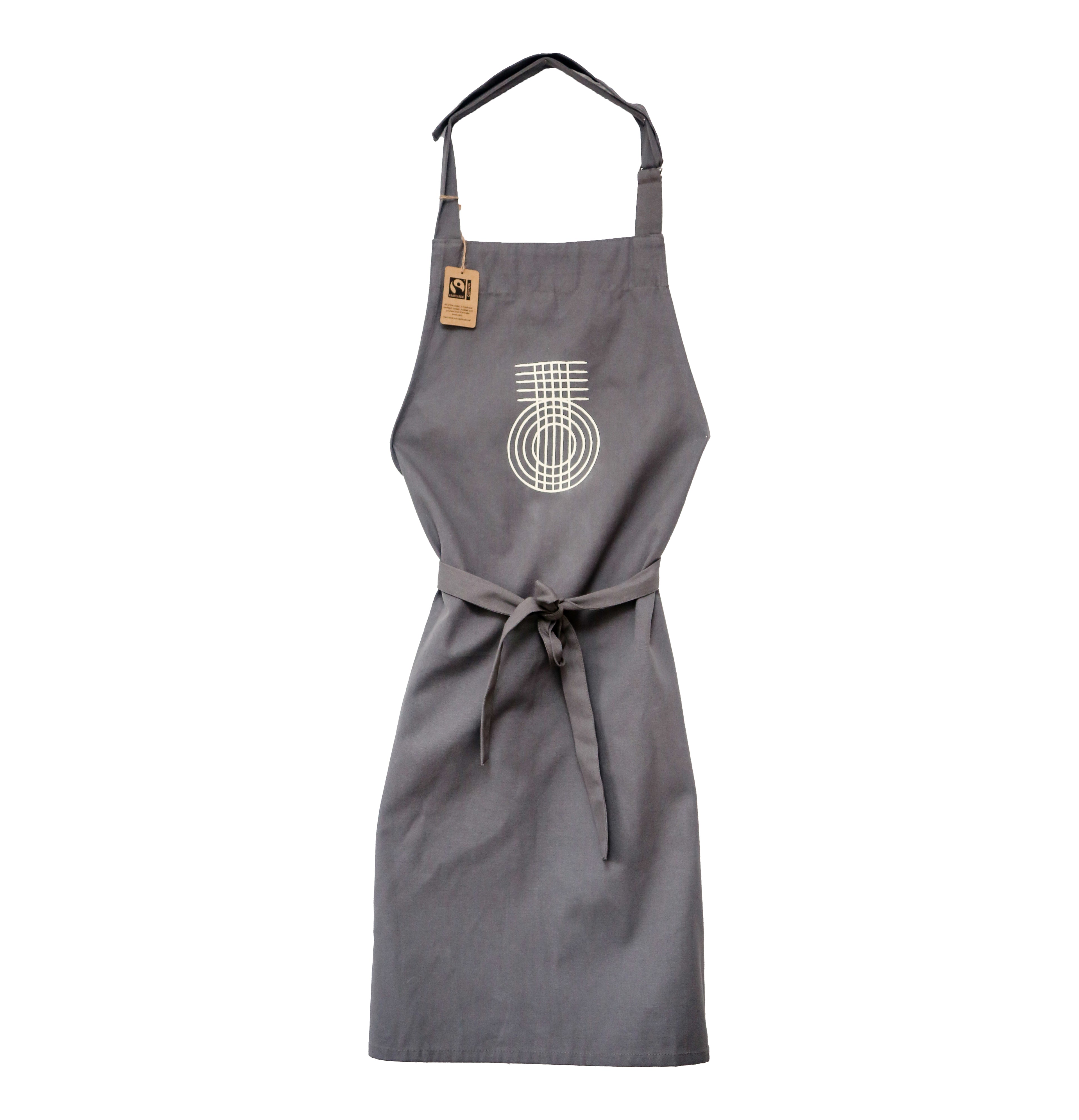 A dark grey apron made with Fairtrade cotton with the TO symbol on the front.