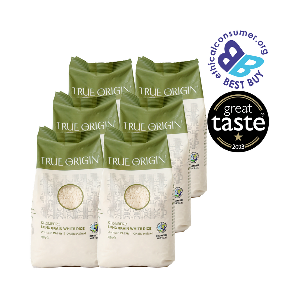 Multiple bags of True Origin Great Taste and Best Buy award winning rice with certification logos on a white background