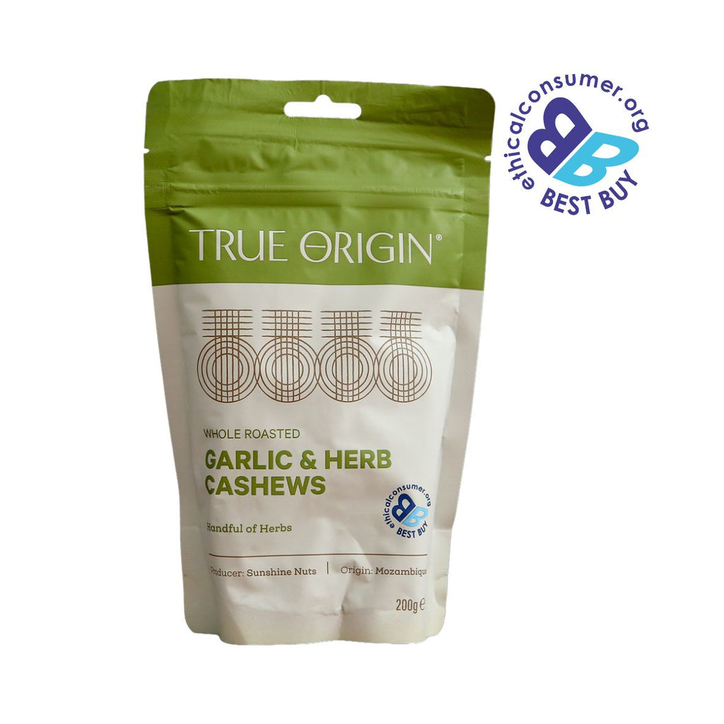 Packet of True Origin Garlic & Herb Cashews with a 'Best Buy' label on a white background from Mozambique.