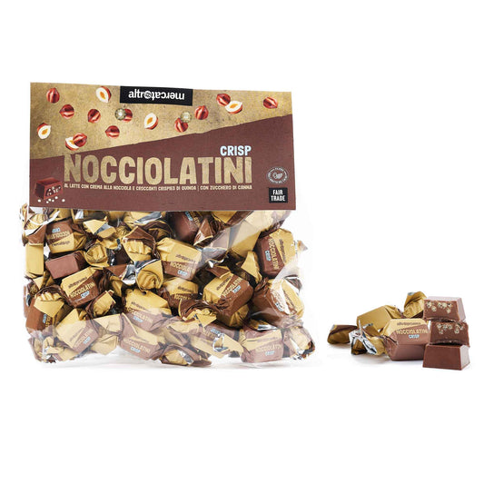 A clear plastic packaging containing crispy chocolate bites, with a brown label displaying the product name and brand.