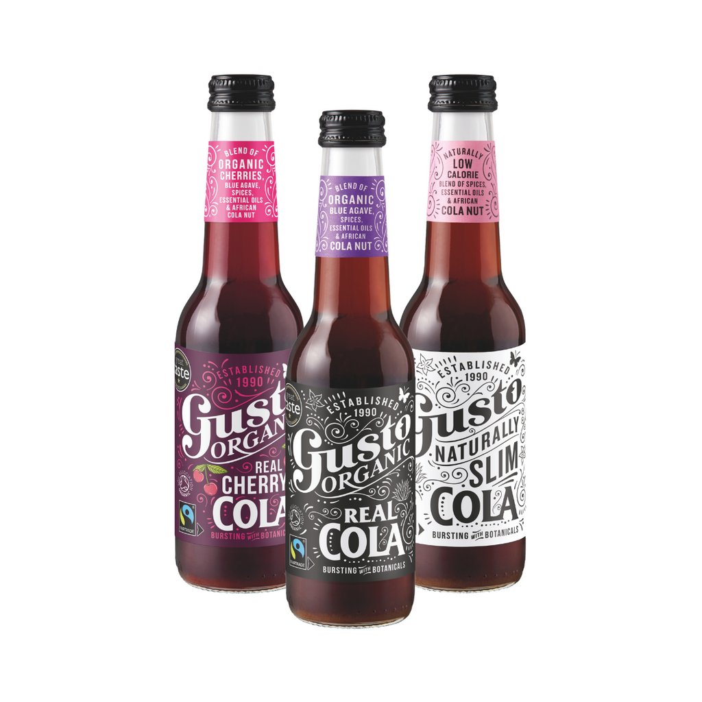 Three bottles of Gusto Organic Cola on a white background