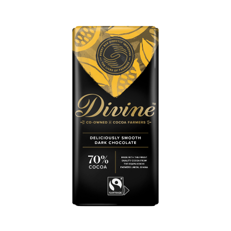 A bar of Divine 70% dark chocolate with a yellow and black wrapper, indicating it is made with fair trade ingredients.
