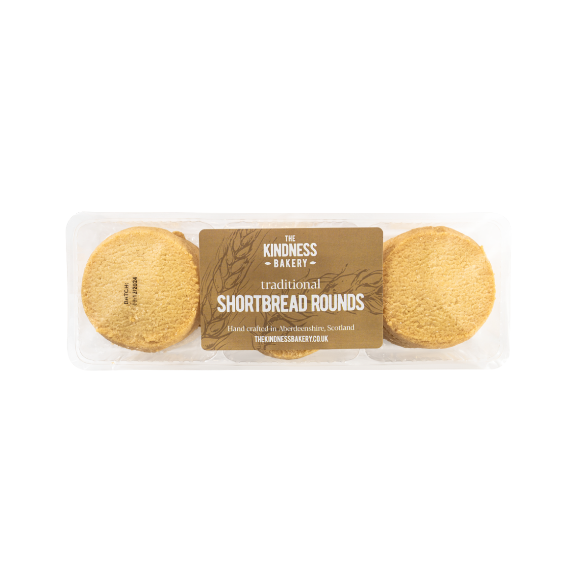 Packaging of The Kindness Bakery traditional shortbread rounds, showing two shortbread biscuits on either side of the packaging with a brown paper label in the center.
