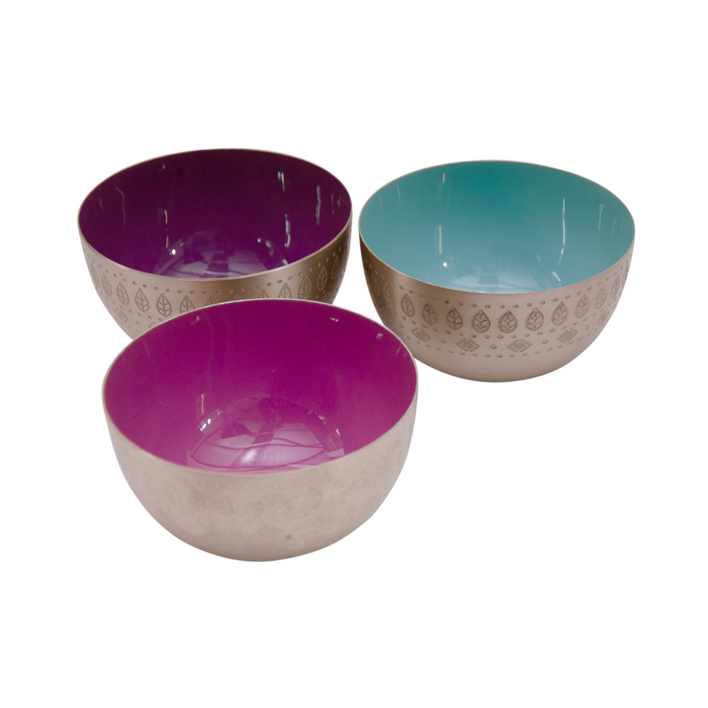 A set of three etched dishes with enamel interiors in purple and teal colors, and an etched chrome effect exterior featuring a contemporary leaf design.