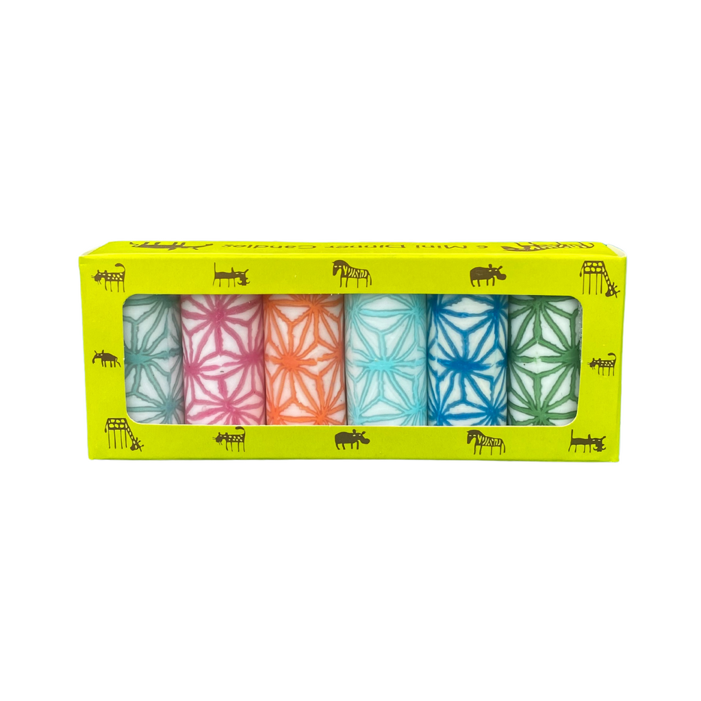 A pack of 6 dinner candles, each with a different colour web design in a yellow box with African animals.