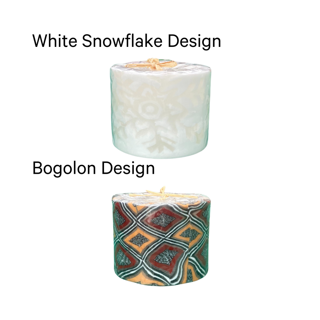 Two tealight holders, the top one has a white snowflake design and the bottom one has an African bogolon desing.
