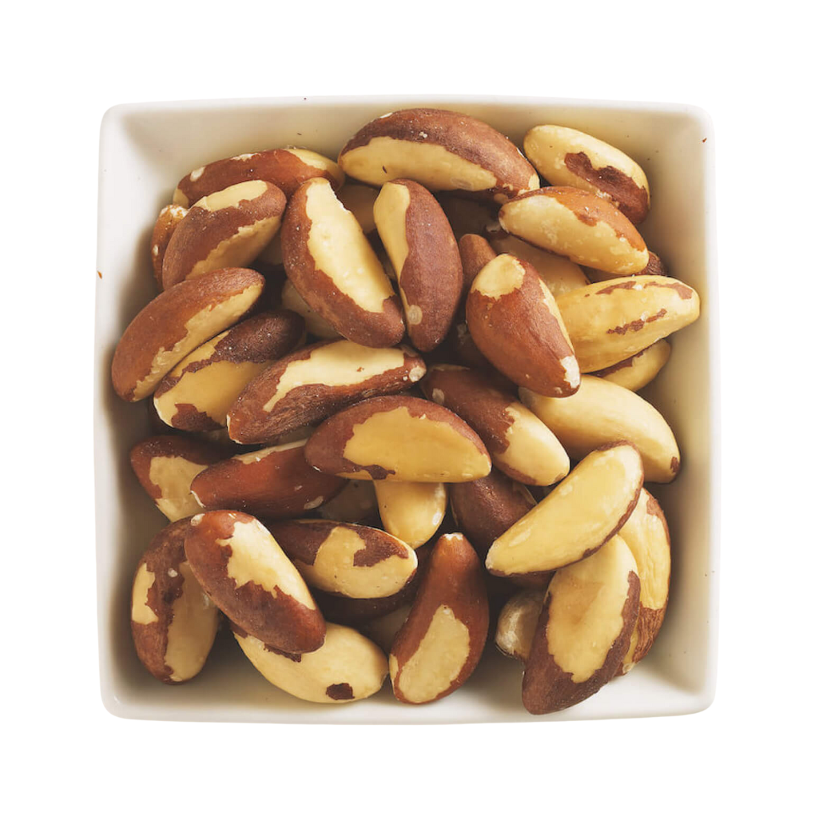 A bowl of Fairtrade organic brazil nuts.