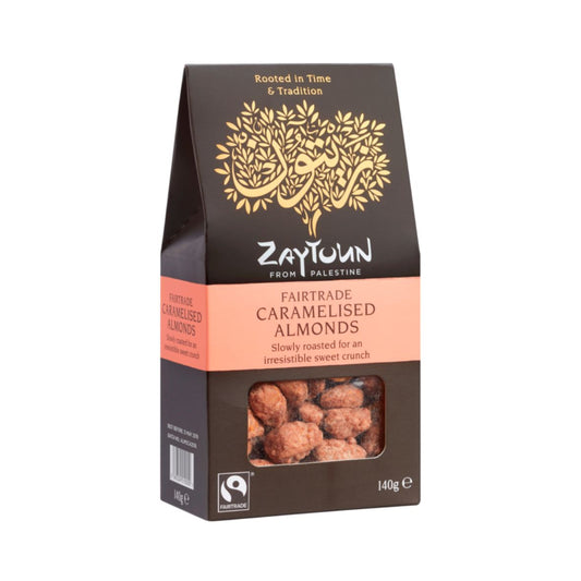 A box of Zaytoun caramelised almonds from Palestine with a window showing the almonds and the Fairtrade logo.