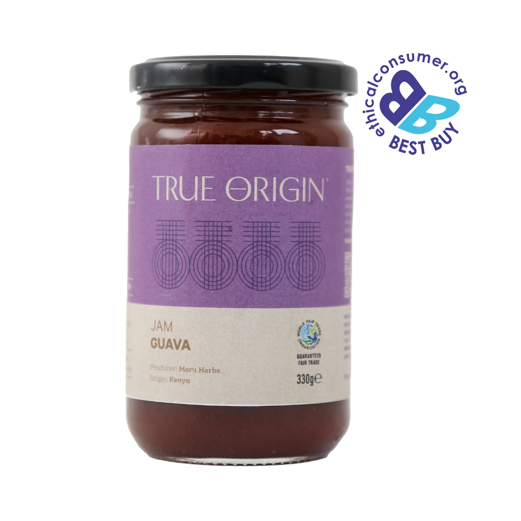 Jar of True Origin ethical Best Buy guava jam with a purple label on a white background and WFTO logo on jar.