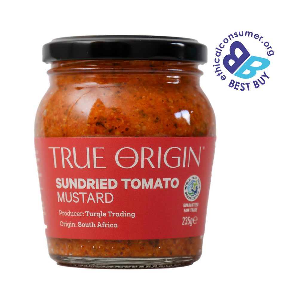 Jar of True Origin Sundried Tomato Mustard with a red label on a white background. Delicious.