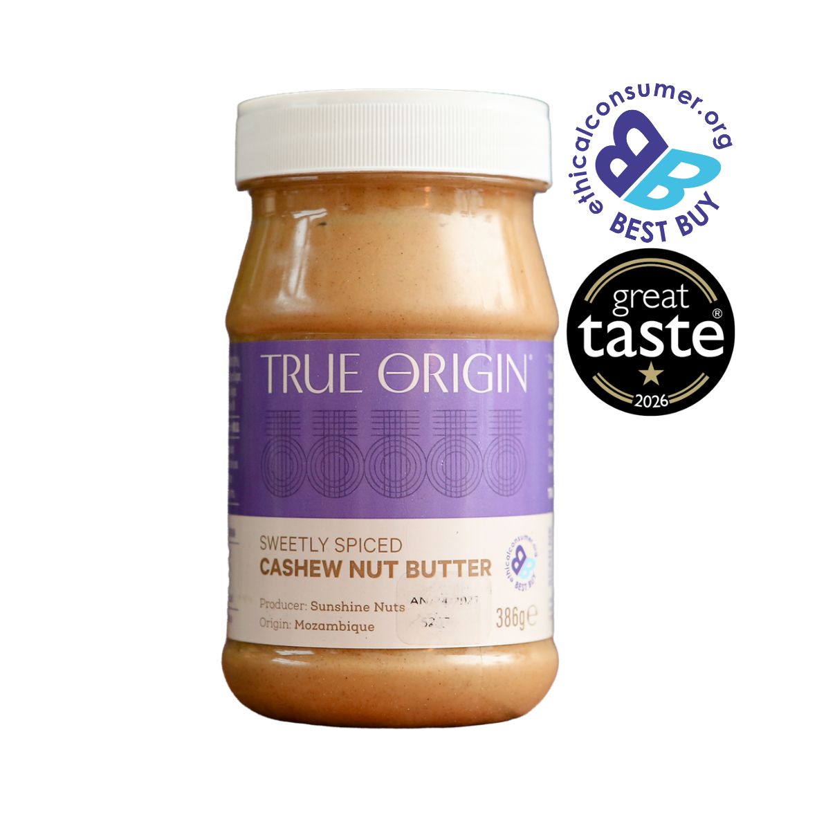 A jar of True Origin Sweetly Spiced Cashew Nut Butter on a white background, featuring a purple and white label. Two award badges are displayed on the top right: The Best Buy Logo and 1 star Great Taste Award 2026.
