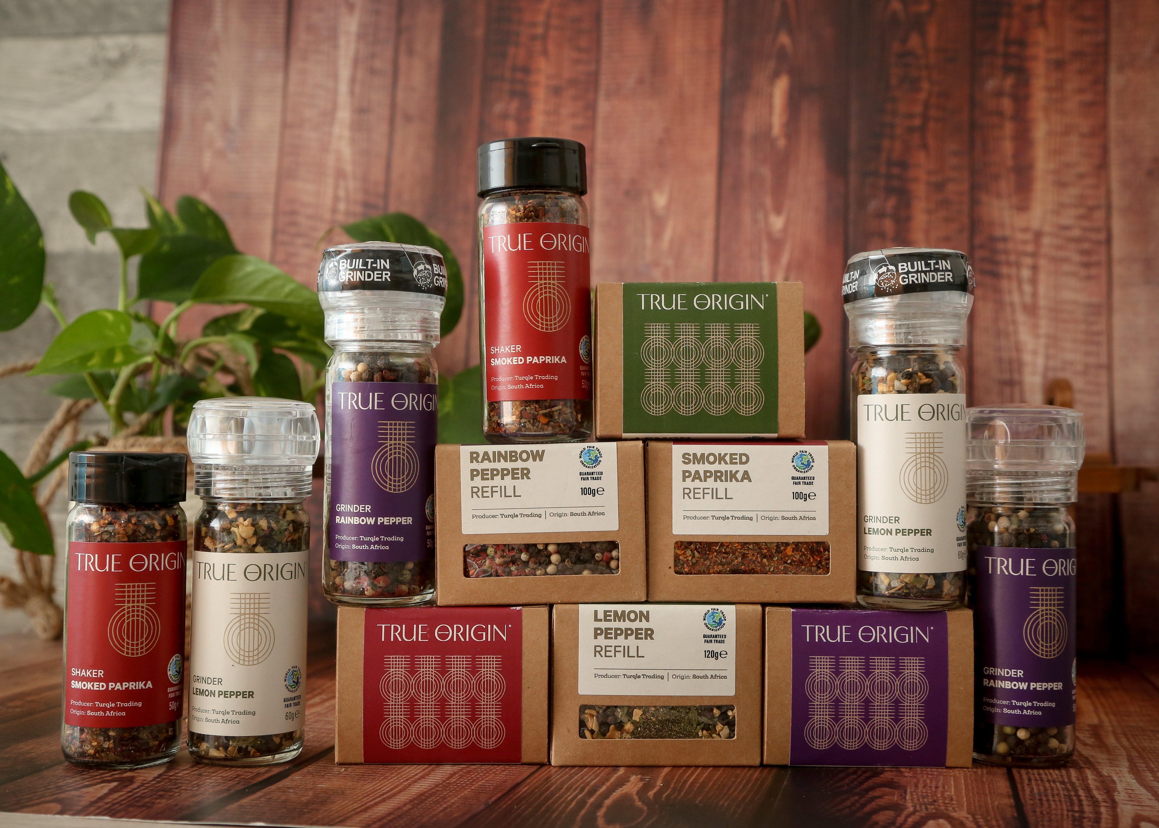 A full range image of all the grinders. shakers and refill boxes in the True Origin range.