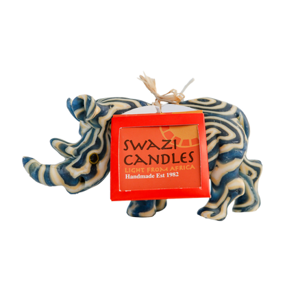 Candle in the shape of a rhino with 'Swazi Candles' packaging on a white background