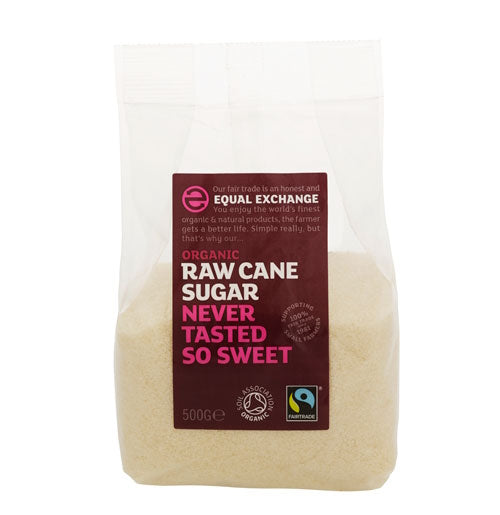 A pack of Equal Exchange organic raw cane sugar in a clear plastic bag, with a label displaying the brand and product details.
