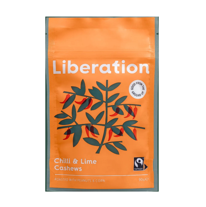 Packaging of Liberation Foods Chilli & Lime Cashews with an illustration of cashew nuts and chilli peppers on an orange background.